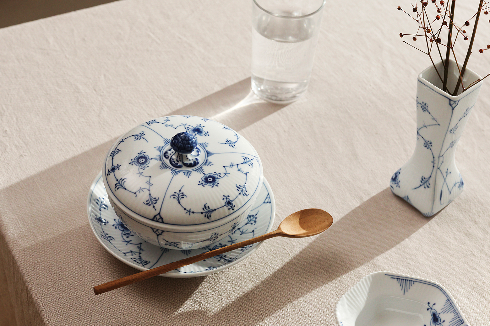 Blue Fluted Plain Bowl with Lid used for a dinner setting